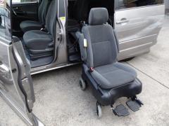Seat detaches from vehicle to be used as wheelchair